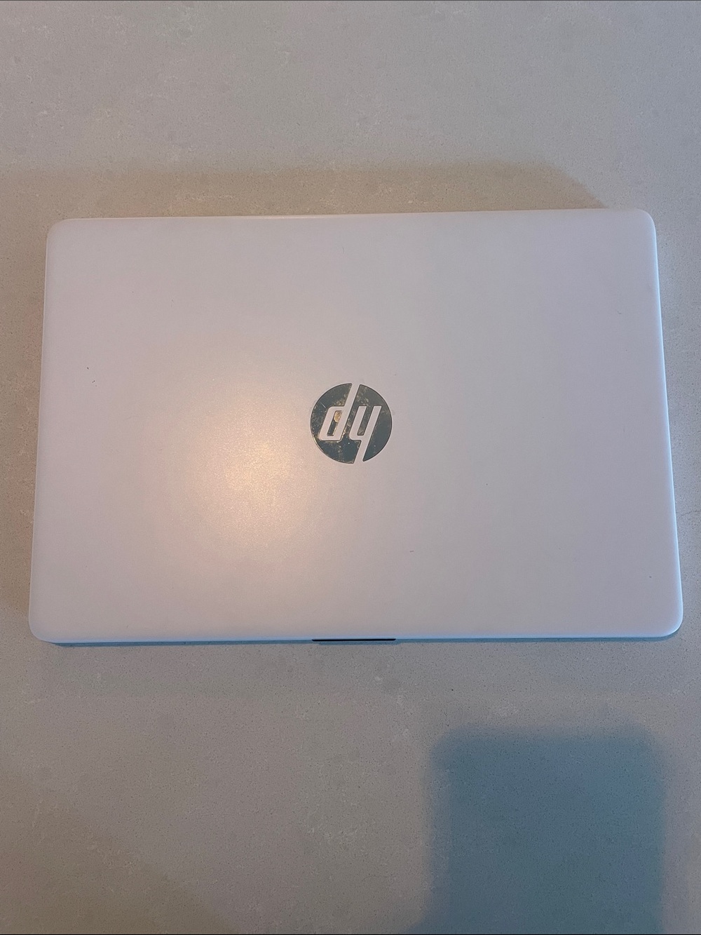 HP White Laptop with Silver Logo